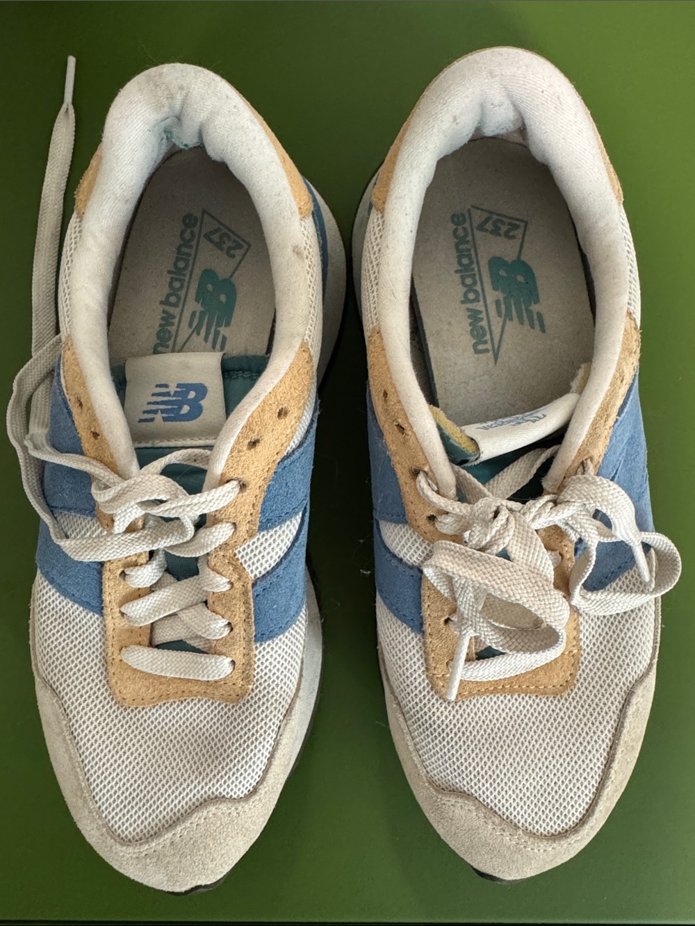 New Balance sneakers in blue, white & tan